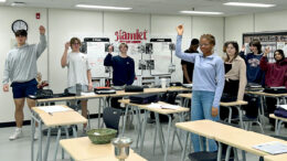 Students in teacher Wendy Dale's class at Holy Cross High School engaged in a "classroom conclave" to mirror the process underway at the Vatican for the selection of the next pope. Here participants make a declaration of completing a ballot. (Photo by Wendy Dale, Greater Saskatoon Catholic Schools)